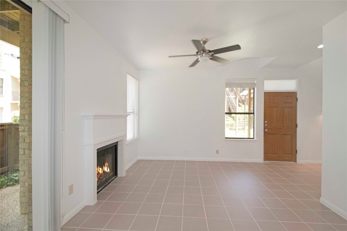611 East 45th Street, Unit 8 Austin, TX 78751 - Photo 28 of 35 a view of an empty room with a window and fireplace