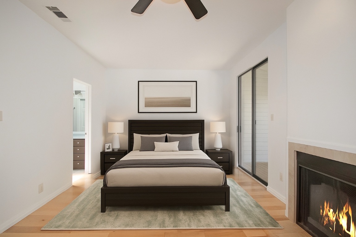 611 East 45th Street, Unit 8 Austin, TX 78751 - Photo 30 of 35 a bedroom with a bed and night stand