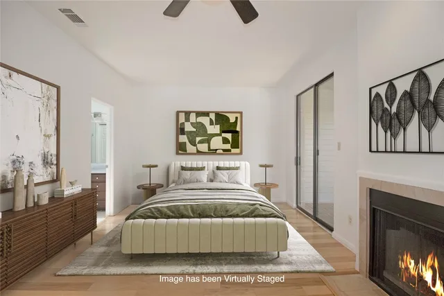 a bedroom with a bed and a couch