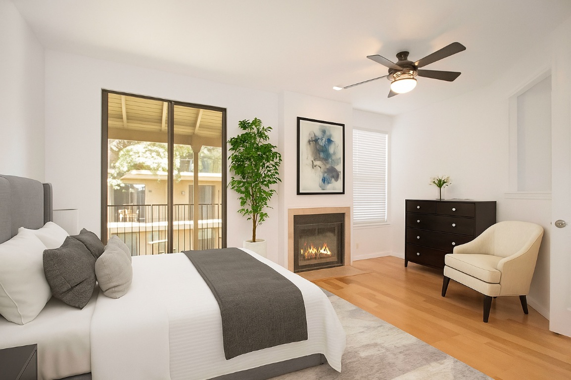 611 East 45th Street, Unit 8 Austin, TX 78751 - Photo 9 of 35 a bedroom with a bed and a couch