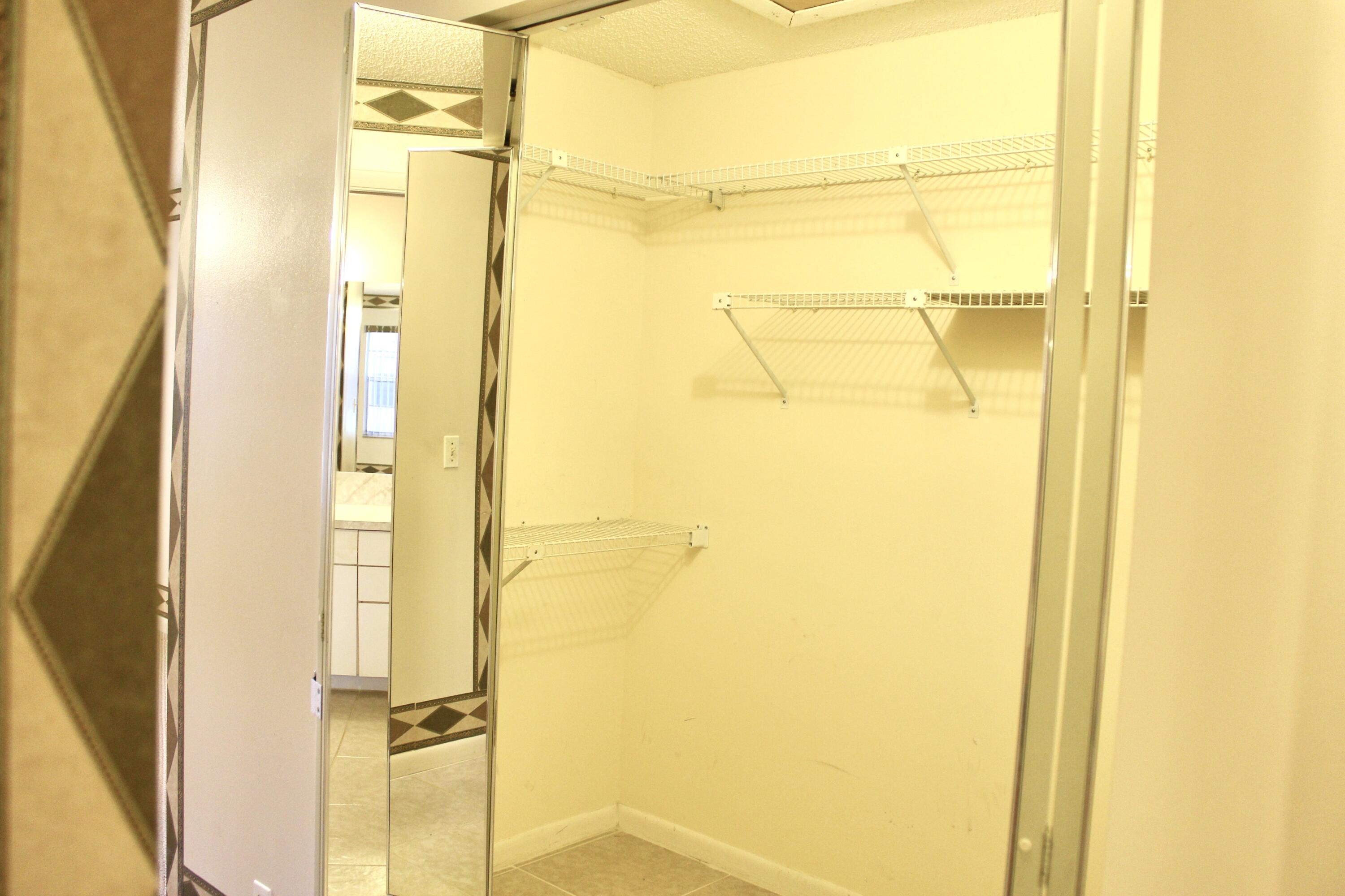 5130 Nesting Way, Unit C Delray Beach, FL 33484 - Photo 18 of 33 a bathroom with a shower