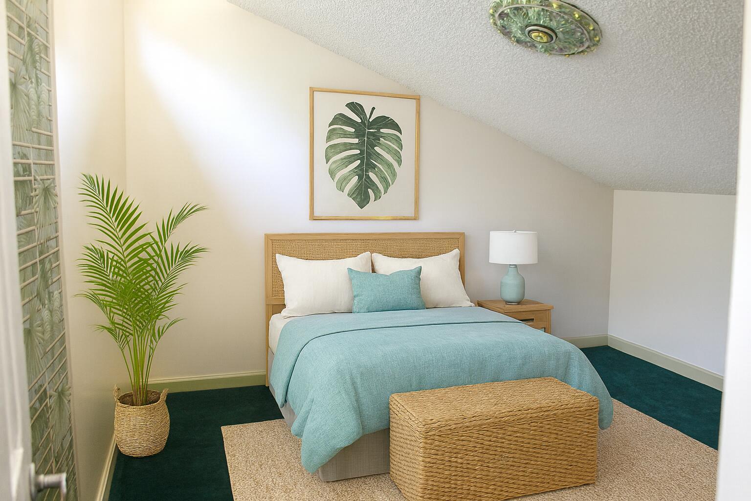 5130 Nesting Way, Unit C Delray Beach, FL 33484 - Photo 23 of 33 a bedroom with a bed and a potted plant