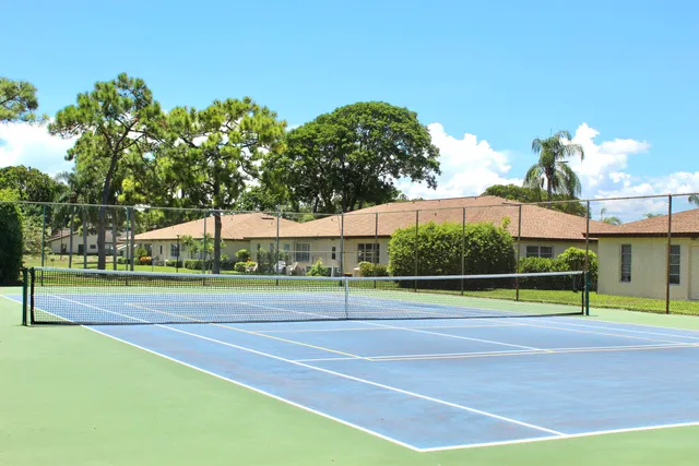 a outdoor dining space with furniture and outdoor view