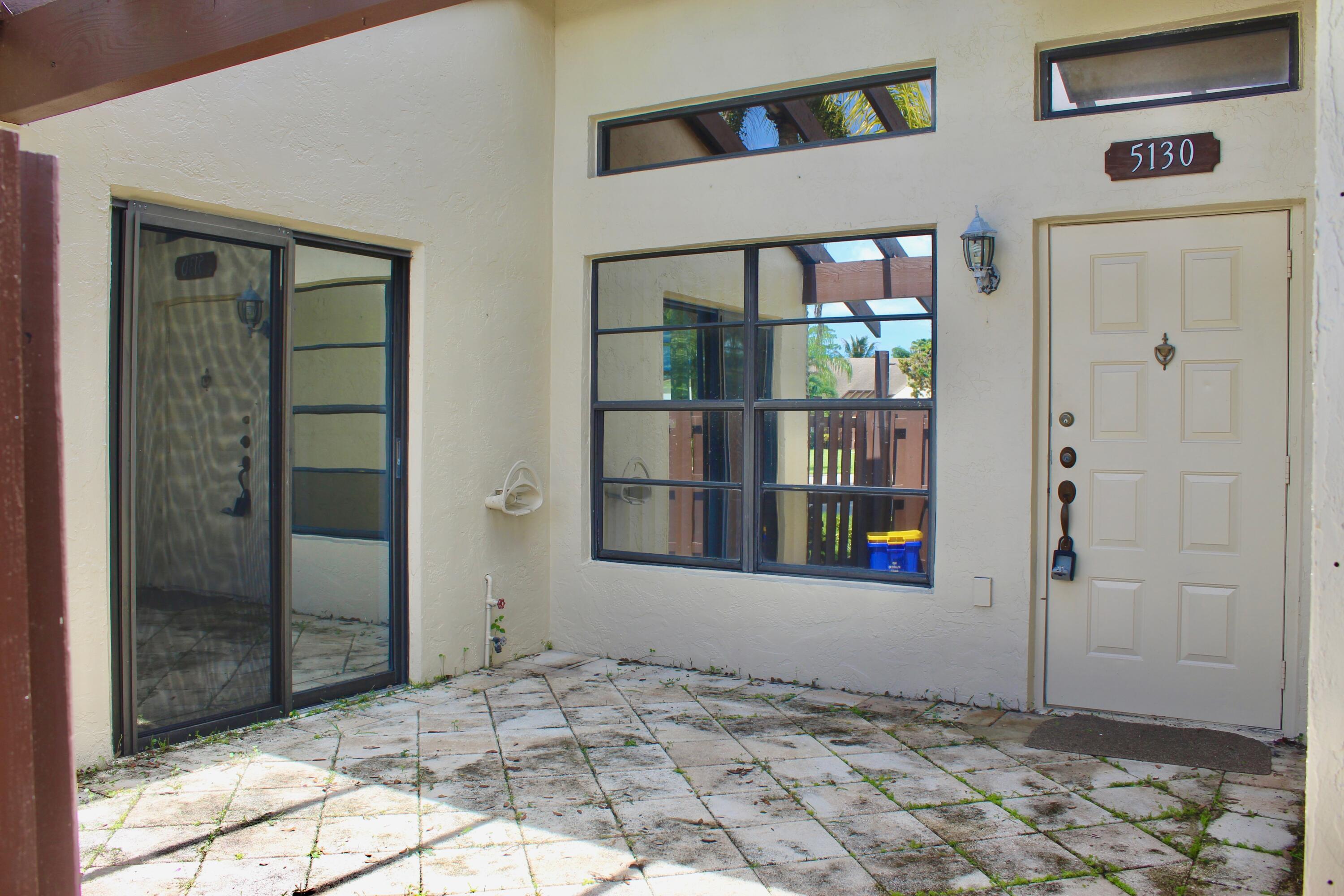 5130 Nesting Way, Unit C Delray Beach, FL 33484 - Photo 4 of 33 a view of an entryway of house