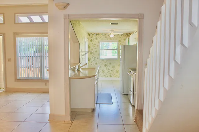 a bathroom with a tub and shower