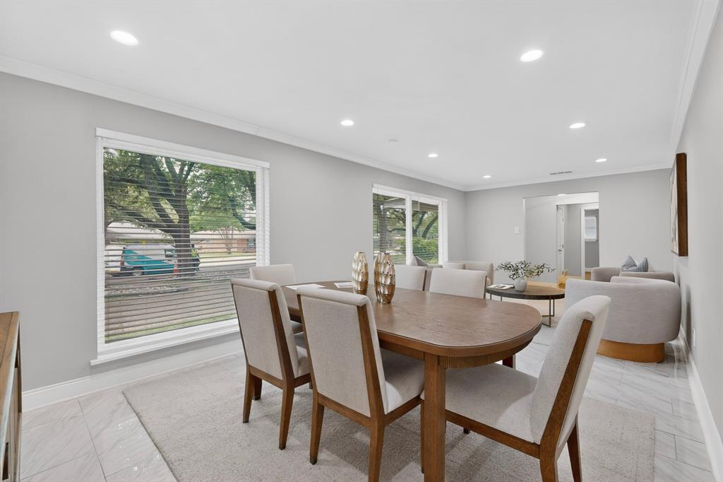 7631 Meadow Road Dallas, TX 75230 - Photo 4 of 40 A bright dining room with a tall, wide window