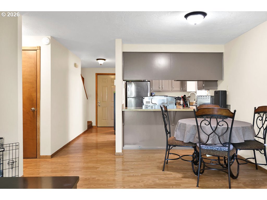 1253 City View Street Eugene, OR 97402 - Photo 7 of 18 a view of a dining room with furniture