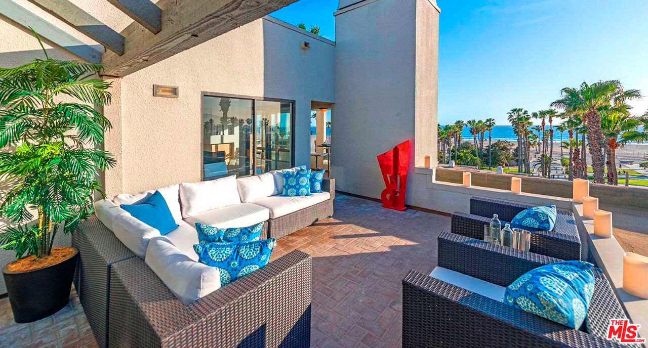 110 Ocean Park Boulevard, Unit 502 Santa Monica, CA 90405 - Photo 9 of 15 a outdoor living space with furniture and a potted plant