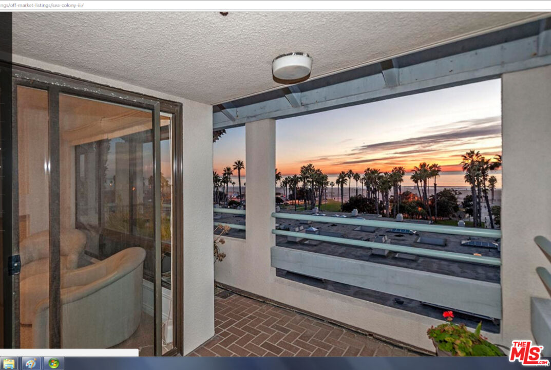 110 Ocean Park Boulevard, Unit 502 Santa Monica, CA 90405 - Photo 10 of 15 a view of a living room and a floor to ceiling window