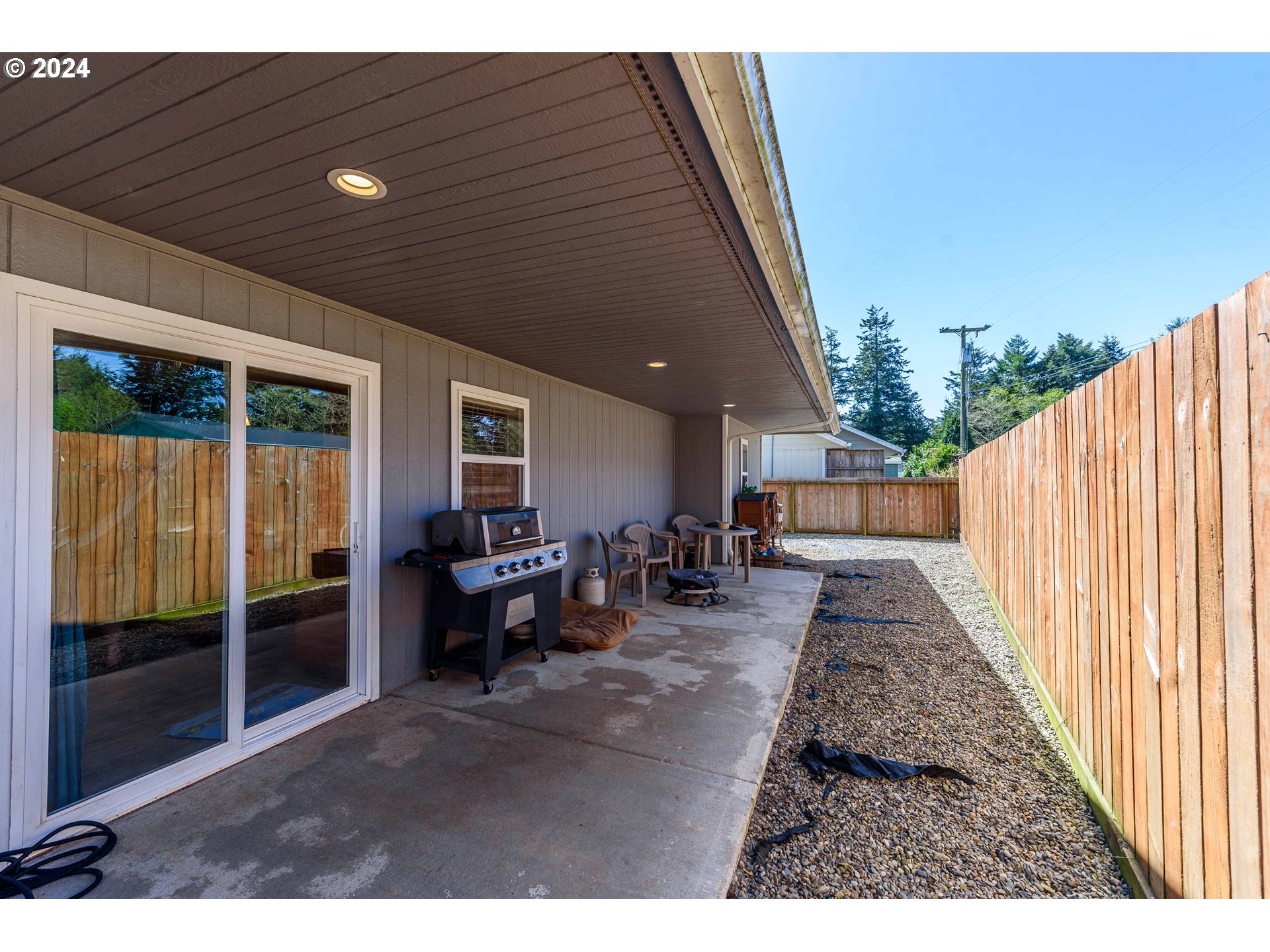 63464 James Drive Coos Bay, OR 97420 - Photo 16 of 25 a view of living room with balcony