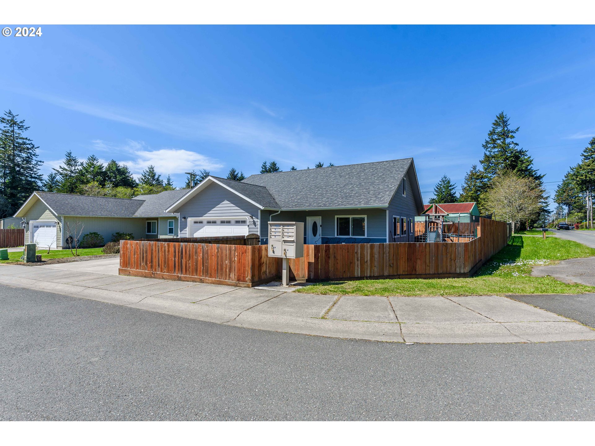 63464 James Drive Coos Bay, OR 97420 - Photo 25 of 25 a view of swimming pool with a yard and fence