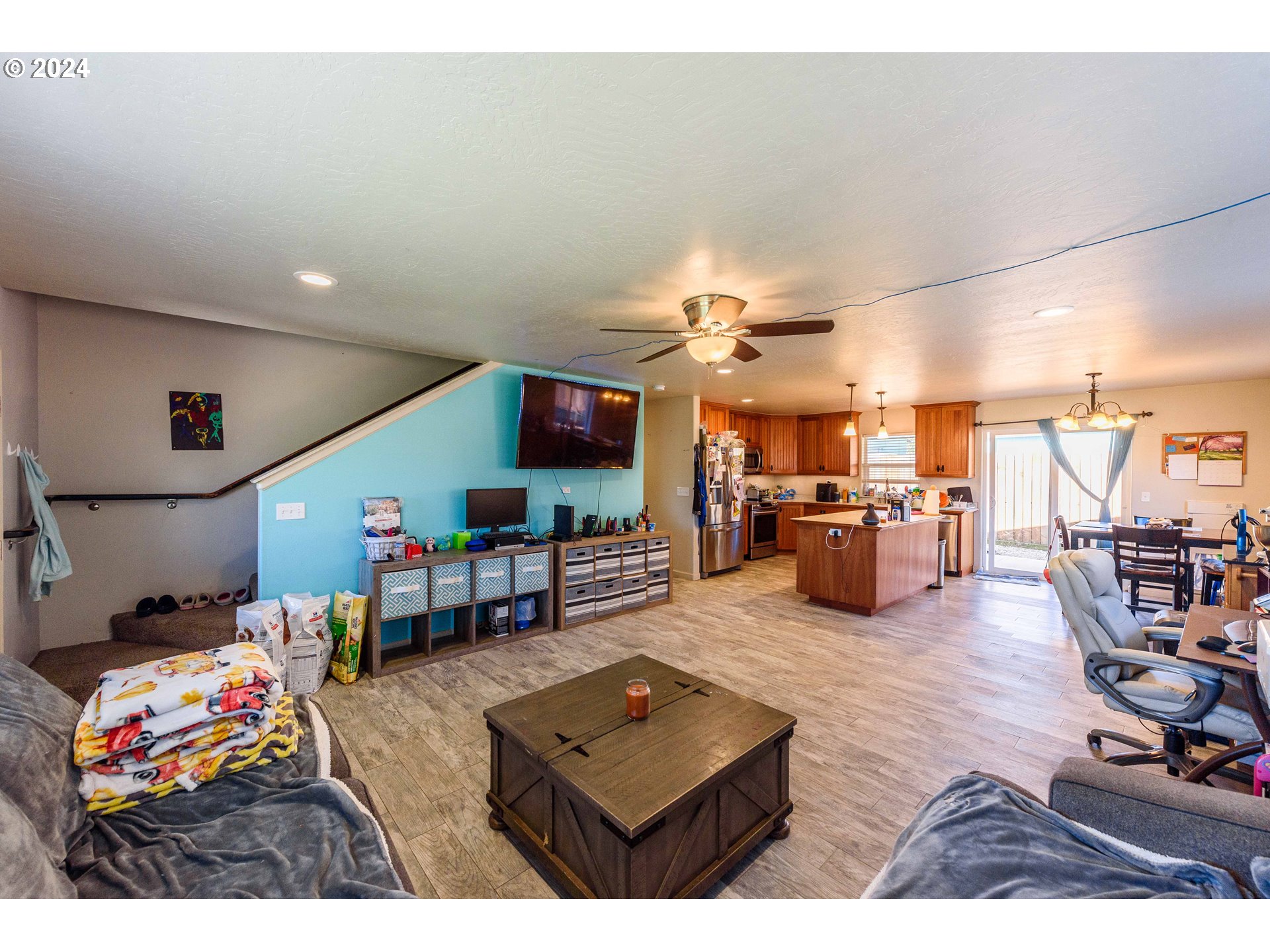 63464 James Drive Coos Bay, OR 97420 - Photo 3 of 25 a living room with furniture and a flat screen tv