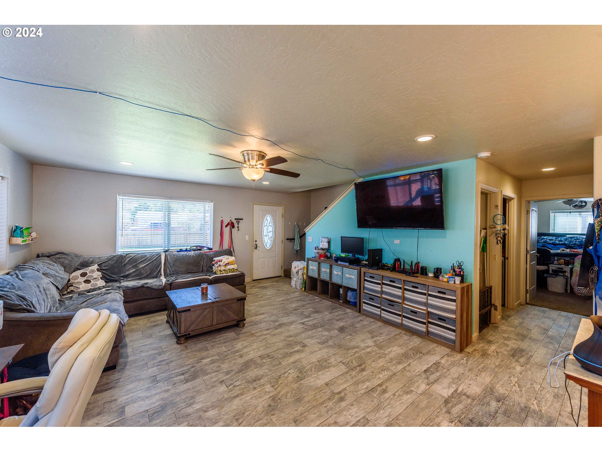63464 James Drive Coos Bay, OR 97420 - Photo 4 of 25 a living room with furniture and a flat screen tv