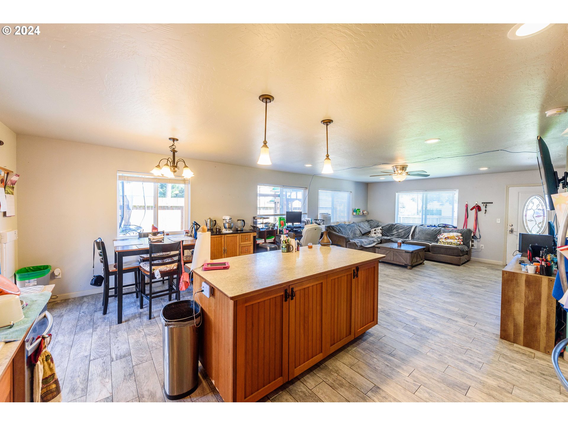 63464 James Drive Coos Bay, OR 97420 - Photo 7 of 25 a kitchen with sink a counter and chairs