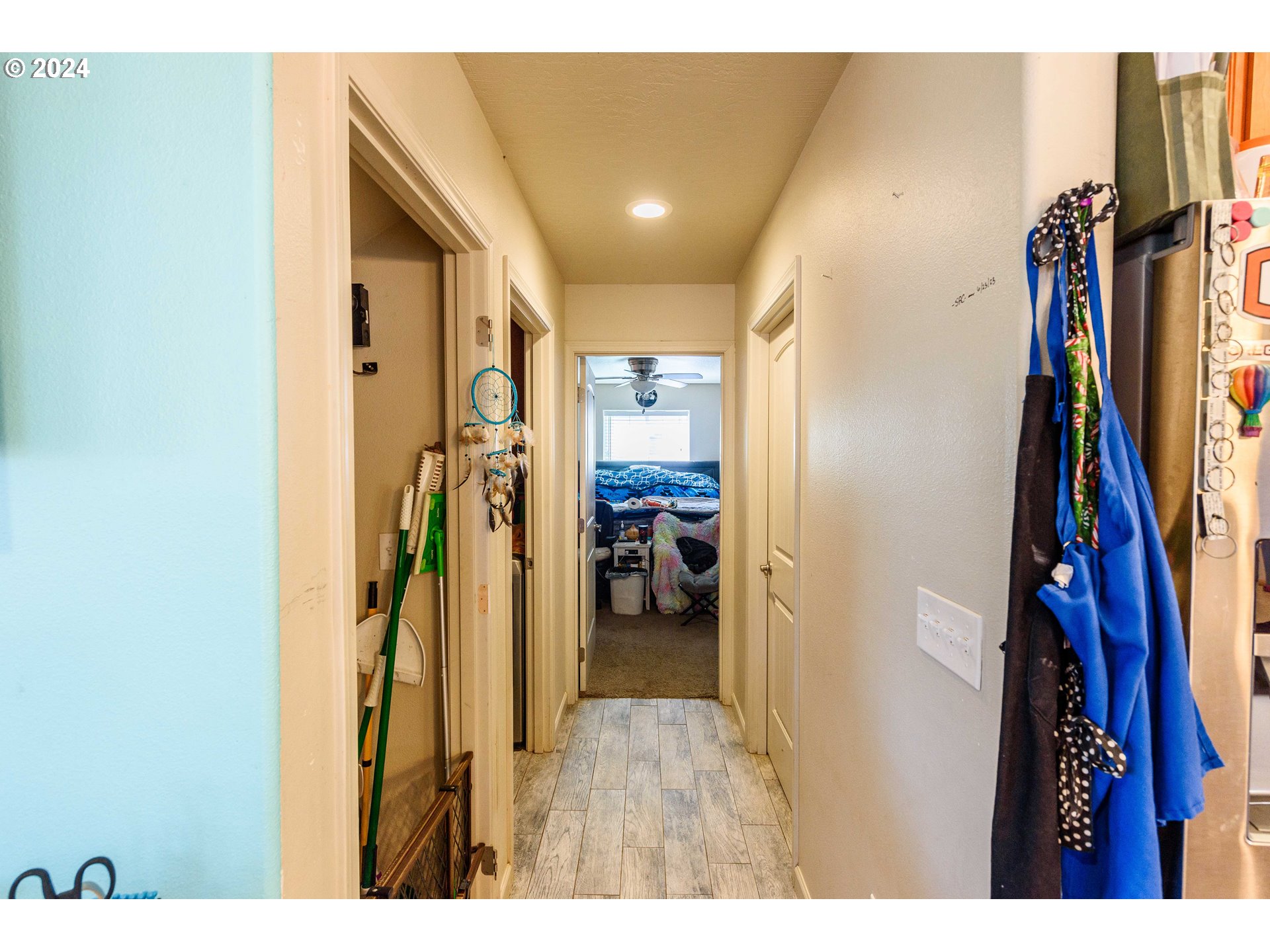 63464 James Drive Coos Bay, OR 97420 - Photo 8 of 25 a view of walk in closet with clothes and shoes