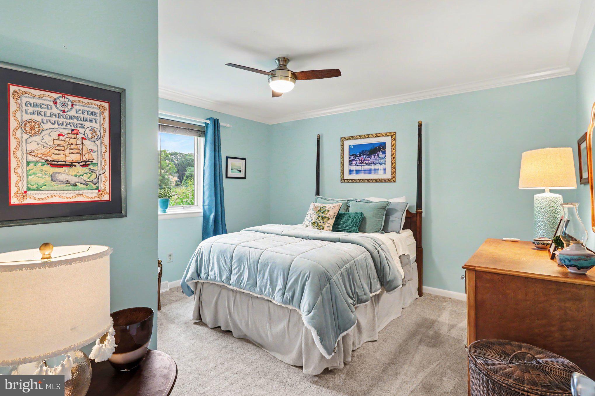 25 East Knowlton Road Media, PA 19063 - Photo 41 of 73 a bed room with a bed and a lamp