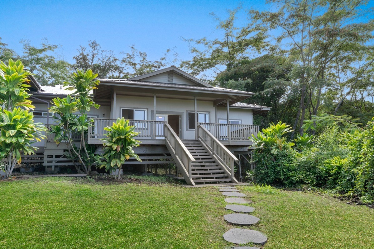 87-410 Kaohe Mauka Road Captain Cook, HI 96704 - Photo 15 of 29 a front view of a house with a yard