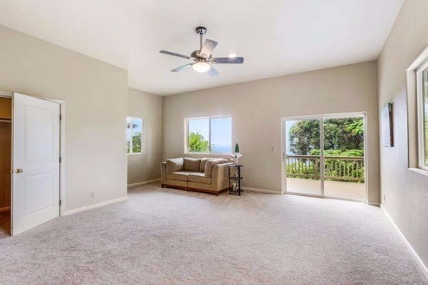 87-410 Kaohe Mauka Road Captain Cook, HI 96704 - Photo 18 of 29 a living room with furniture and a window
