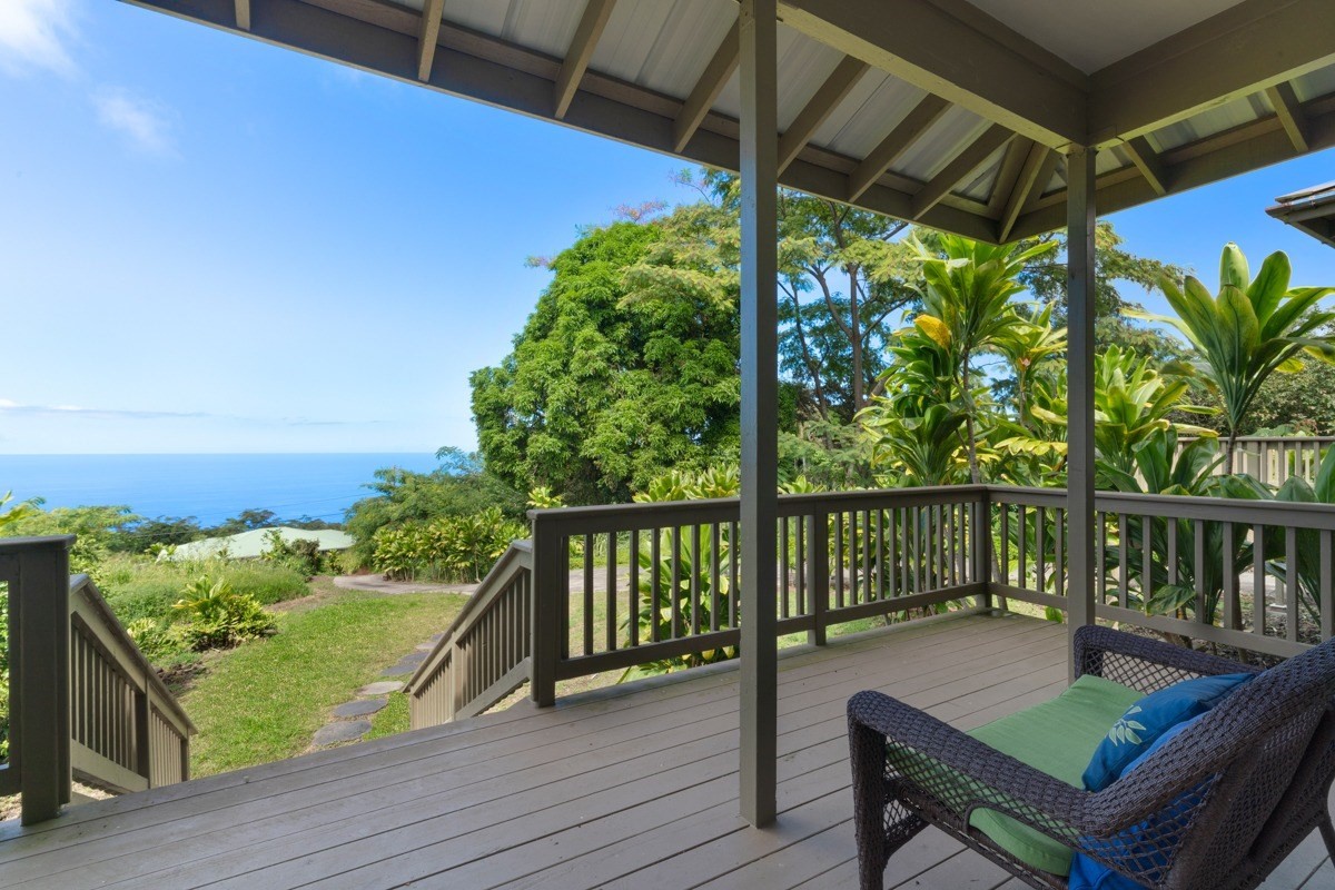 87-410 Kaohe Mauka Road Captain Cook, HI 96704 - Photo 2 of 29 a view of a balcony with chairs