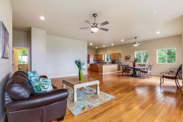 87-410 Kaohe Mauka Road Captain Cook, HI 96704 - Photo 9 of 29 a living room with furniture and wooden floor