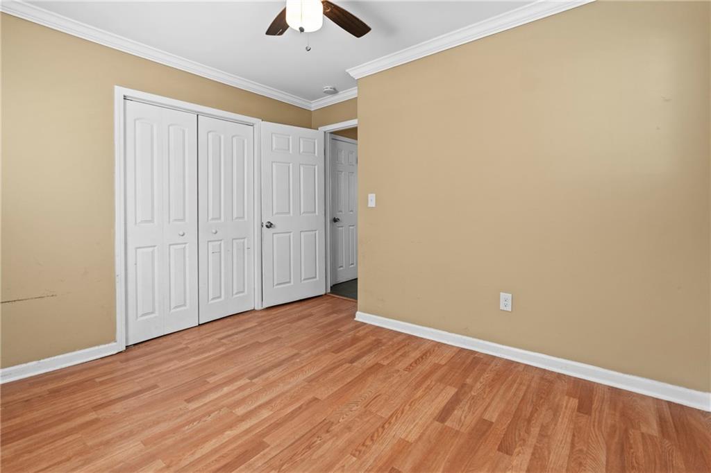 159 Walnut Street Northwest Atlanta, GA 30314 - Photo 14 of 19 a view of an empty room with wooden floor