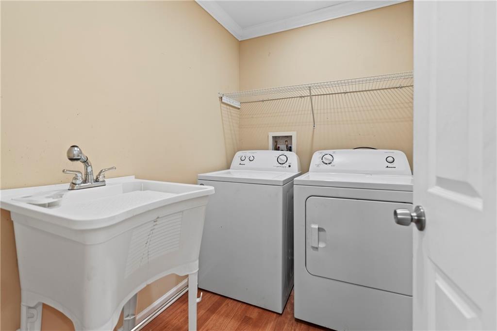 159 Walnut Street Northwest Atlanta, GA 30314 - Photo 16 of 19 a utility room with dryer and washer