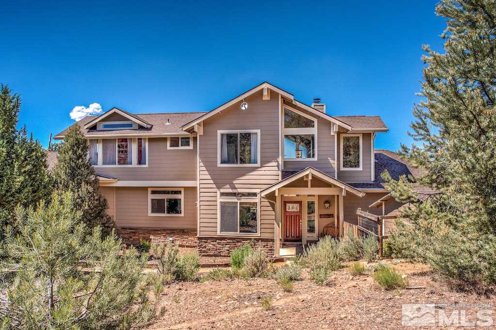 2071 Empire Road Reno, NV 89521 - Photo 17 of 25 a front view of a house with a yard