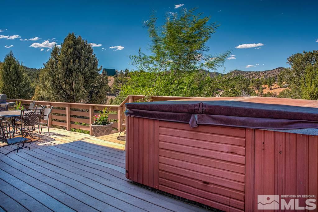 2071 Empire Road Reno, NV 89521 - Photo 19 of 25 a view of a balcony with wooden floor and outdoor space