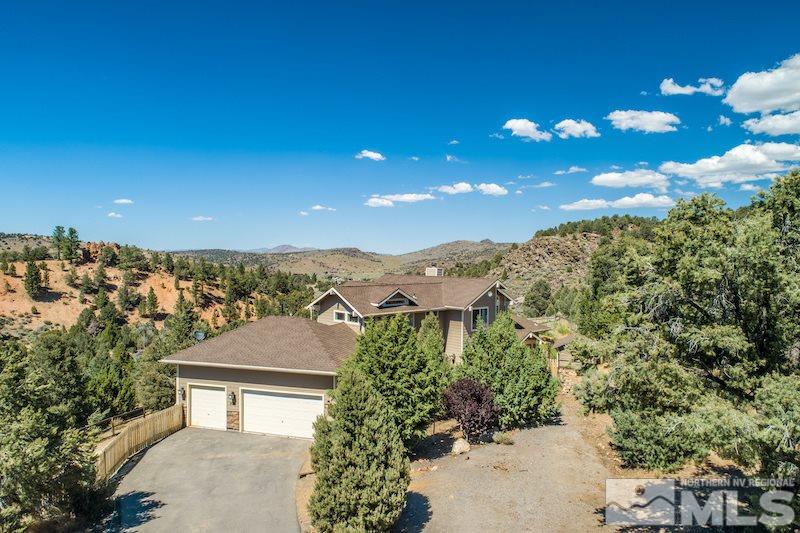 2071 Empire Road Reno, NV 89521 - Photo 23 of 25 a view of a house with a yard and street view