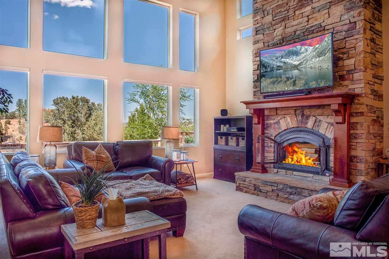 2071 Empire Road Reno, NV 89521 - Photo 3 of 25 a living room with furniture and a fireplace