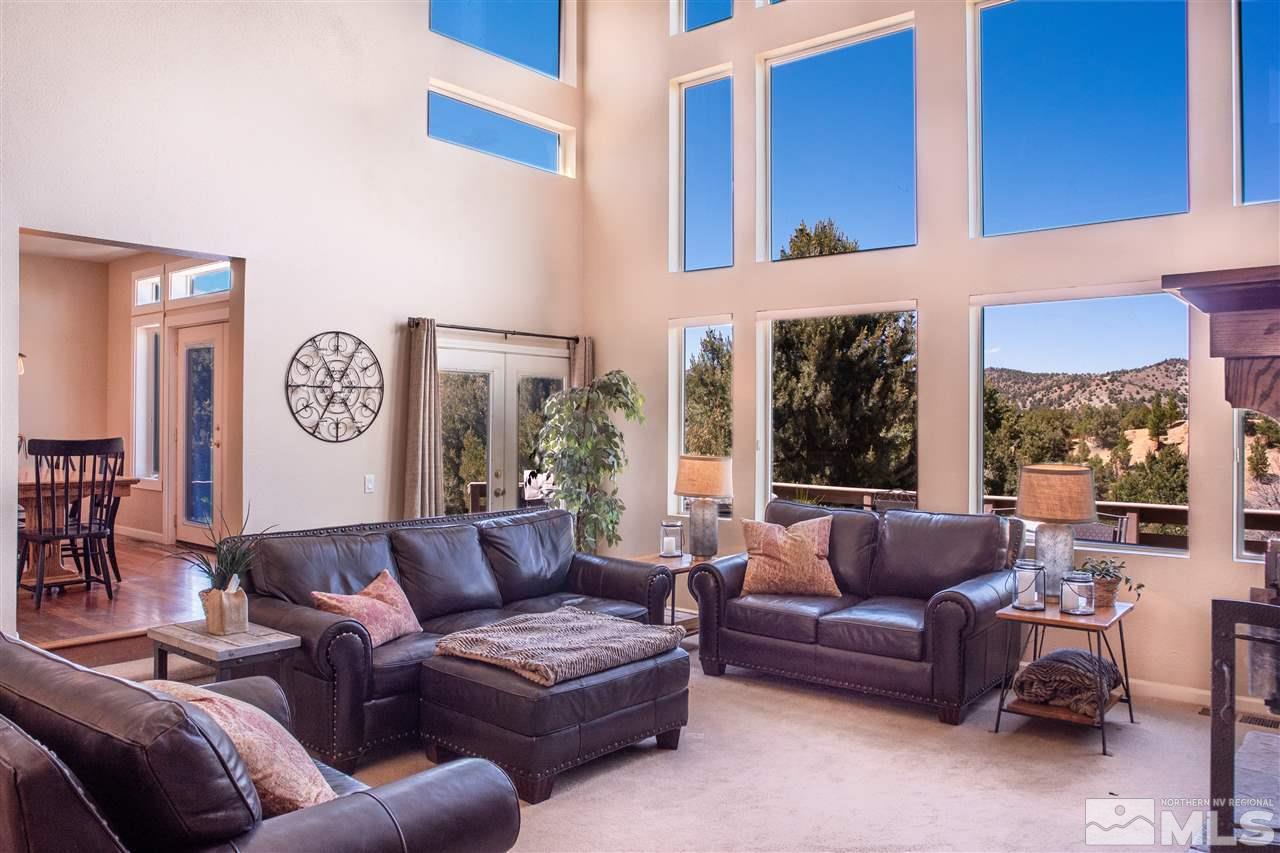 2071 Empire Road Reno, NV 89521 - Photo 4 of 25 a living room with furniture and a large window