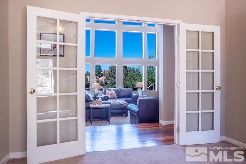 2071 Empire Road Reno, NV 89521 - Photo 8 of 25 a living room with furniture cabinets and window