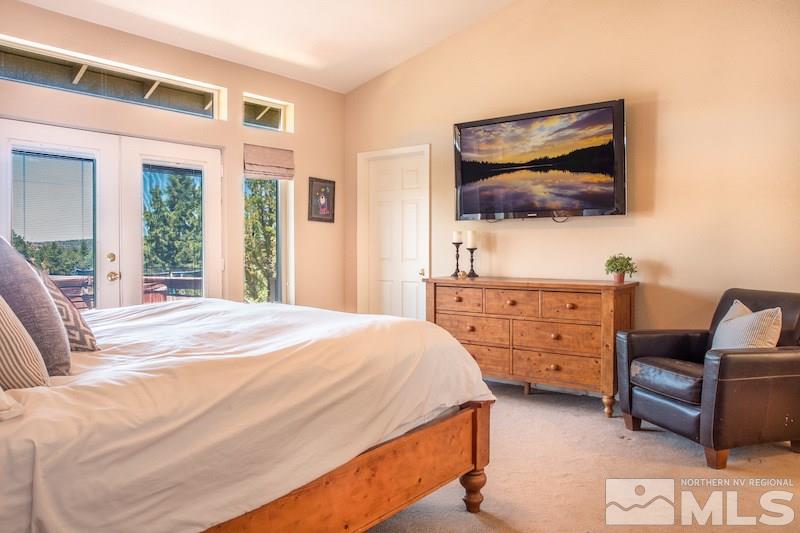 2071 Empire Road Reno, NV 89521 - Photo 10 of 25 a bedroom with a bed and furniture