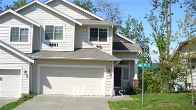 4801 Lake Place South, Unit B Renton, WA 98055 - Photo 1 of 1 a view of a house with a yard and plants