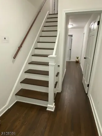 a view of entryway with wooden floor
