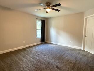 8544 Laredo Street Navarre, FL 32566 - Photo 17 of 36 a view of empty room with ceiling fan