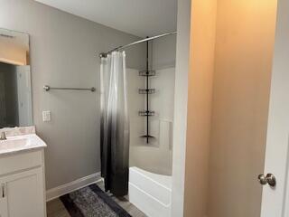 8544 Laredo Street Navarre, FL 32566 - Photo 19 of 36 a bathroom with a shower and a sink