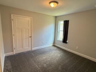 8544 Laredo Street Navarre, FL 32566 - Photo 25 of 36 an empty room with windows