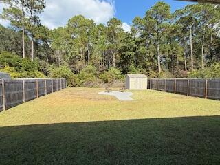8544 Laredo Street Navarre, FL 32566 - Photo 30 of 36 a view of outdoor space and yard