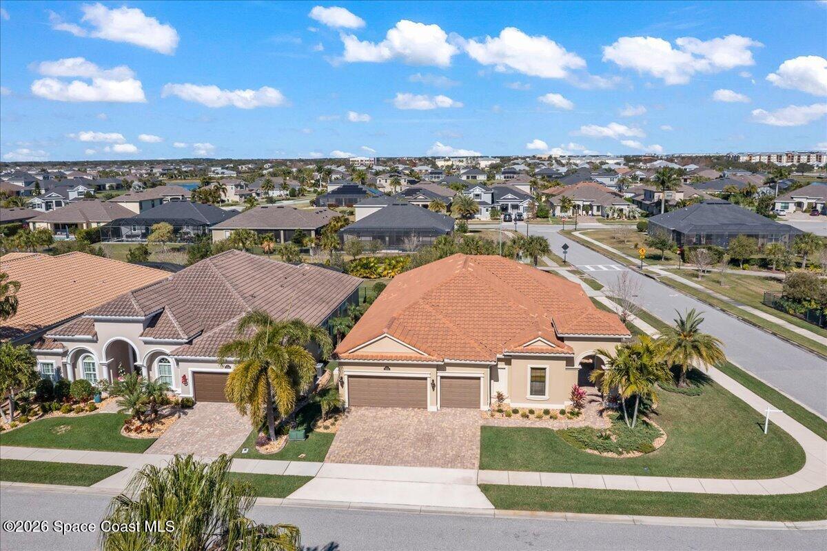 2906 Balting Place Melbourne, FL 32940 - Photo 2 of 44 an aerial view of residential houses with outdoor space and river