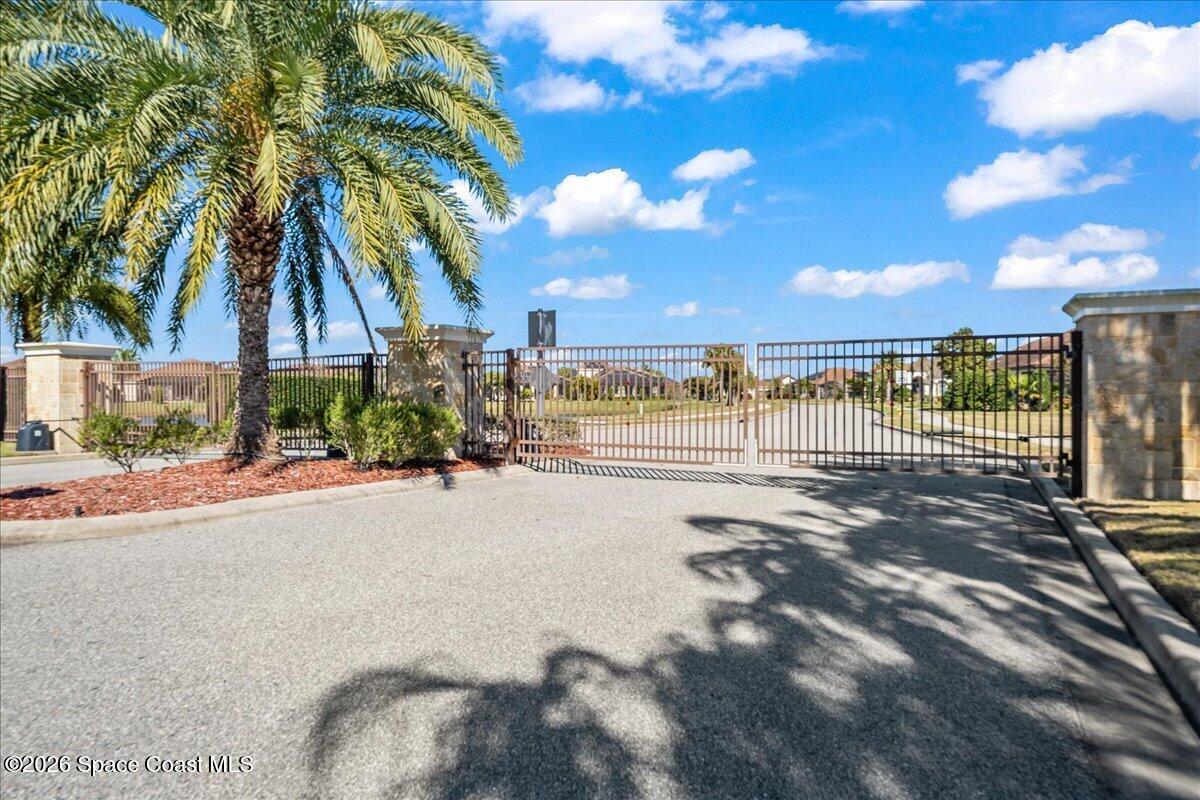 2906 Balting Place Melbourne, FL 32940 - Photo 42 of 44 a view of a palm tree with an outdoor space