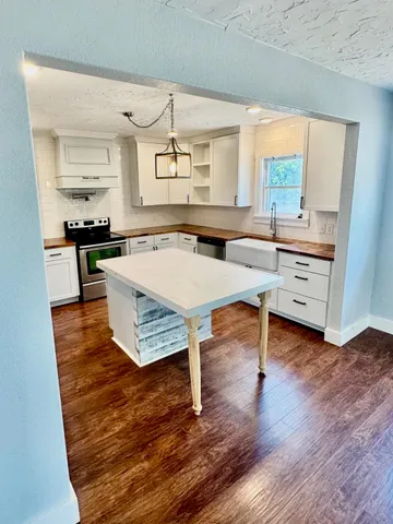 a room with furniture and window