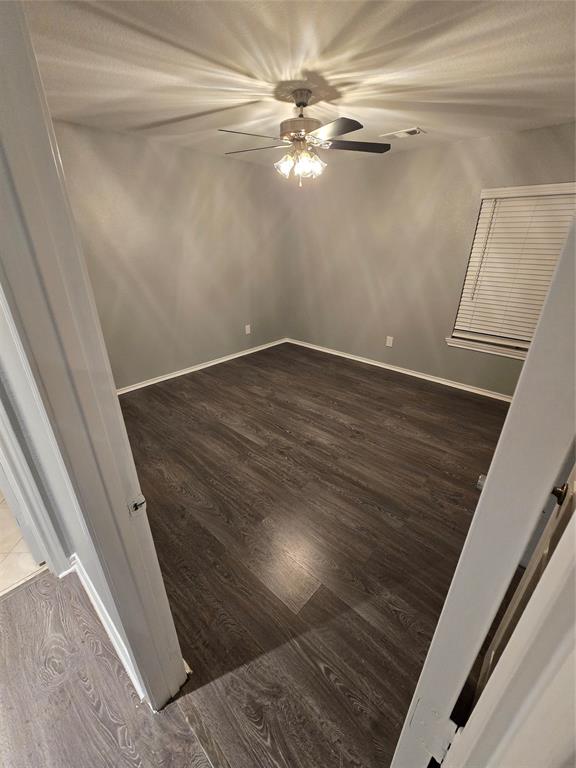 700 White Fields Way Arlington, TX 76002 - Photo 26 of 31 a view of a room with wooden floor and white walls