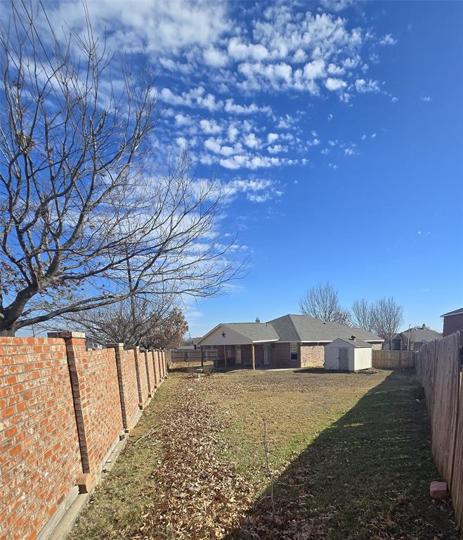 700 White Fields Way Arlington, TX 76002 - Photo 28 of 31 a view of a house with a yard