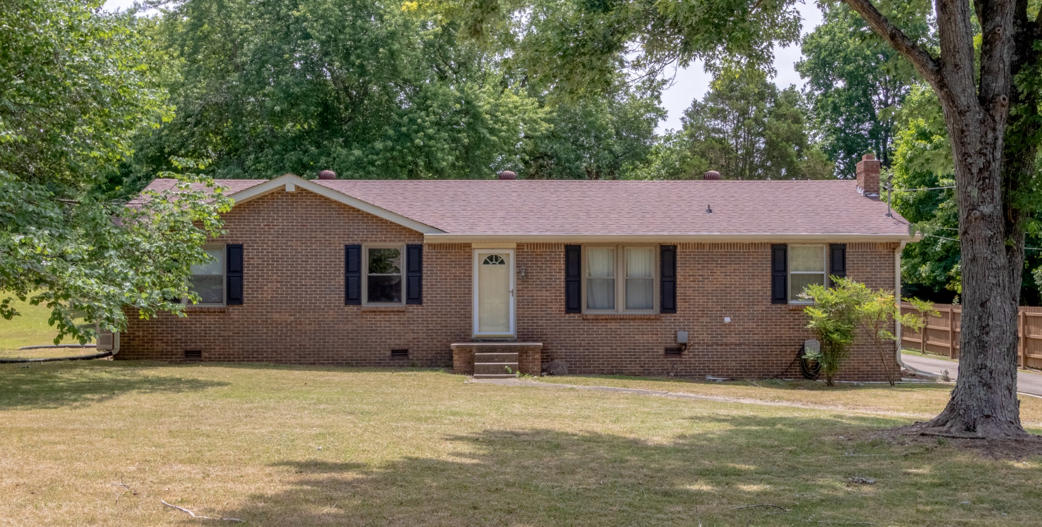 571 Bryan Road Clarksville, TN 37043 - Photo 2 of 7 a house with trees in the background