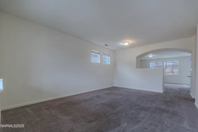 a kitchen with a sink and refrigerator