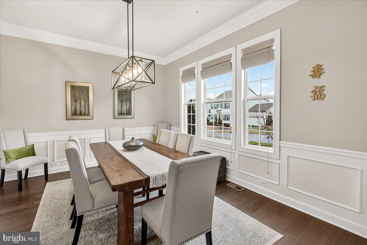 5487 Tallyn Ridge Drive Frederick, MD 21704 - Photo 13 of 80 a view of a dining room with furniture window and outside view