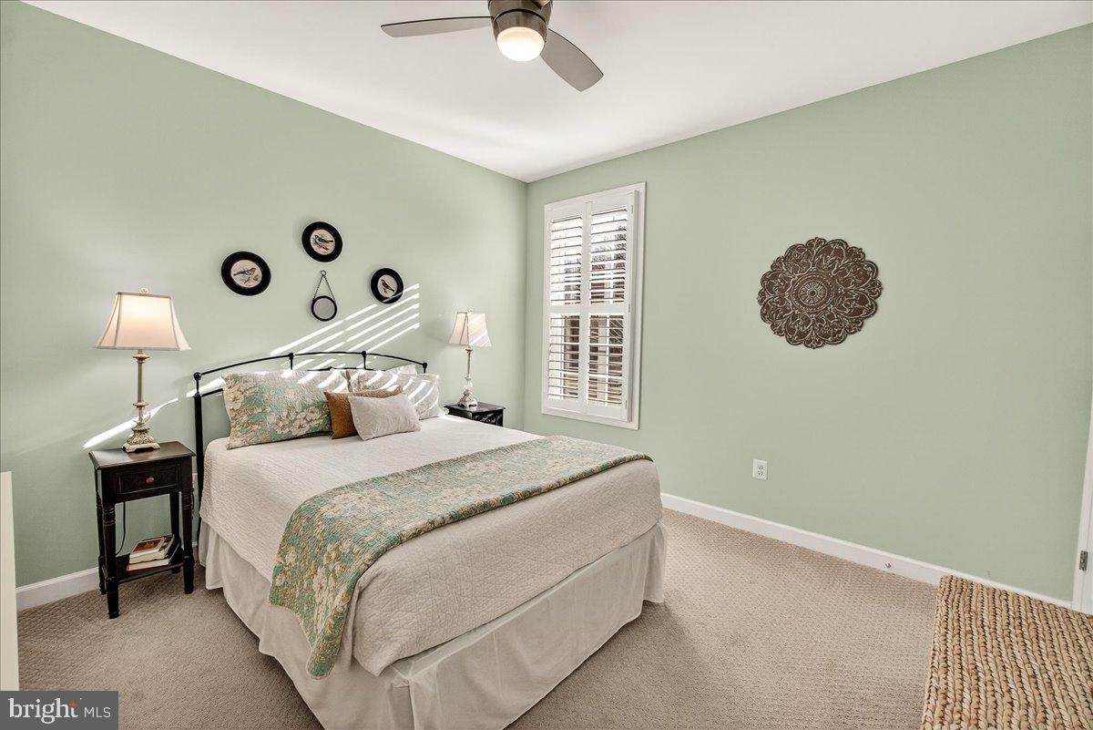 5487 Tallyn Ridge Drive Frederick, MD 21704 - Photo 37 of 80 a bedroom with a bed and a window
