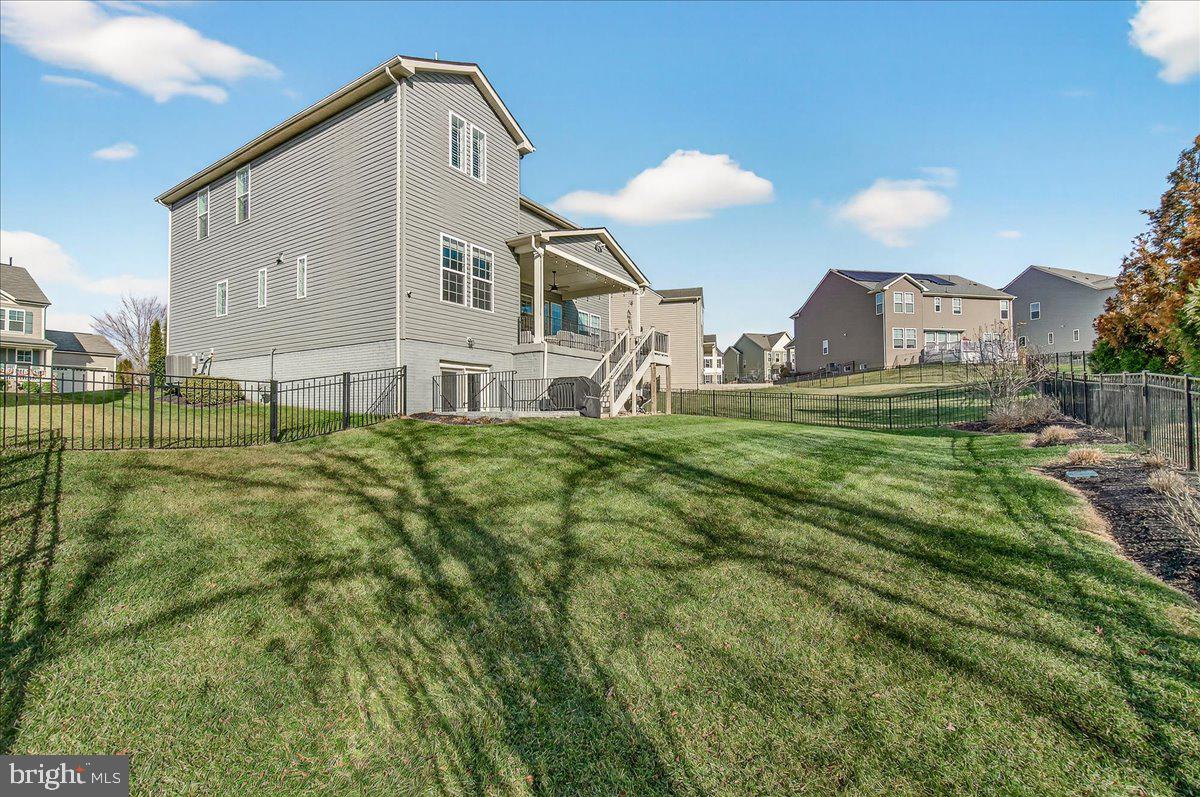 5487 Tallyn Ridge Drive Frederick, MD 21704 - Photo 61 of 80 a front view of a house with a yard