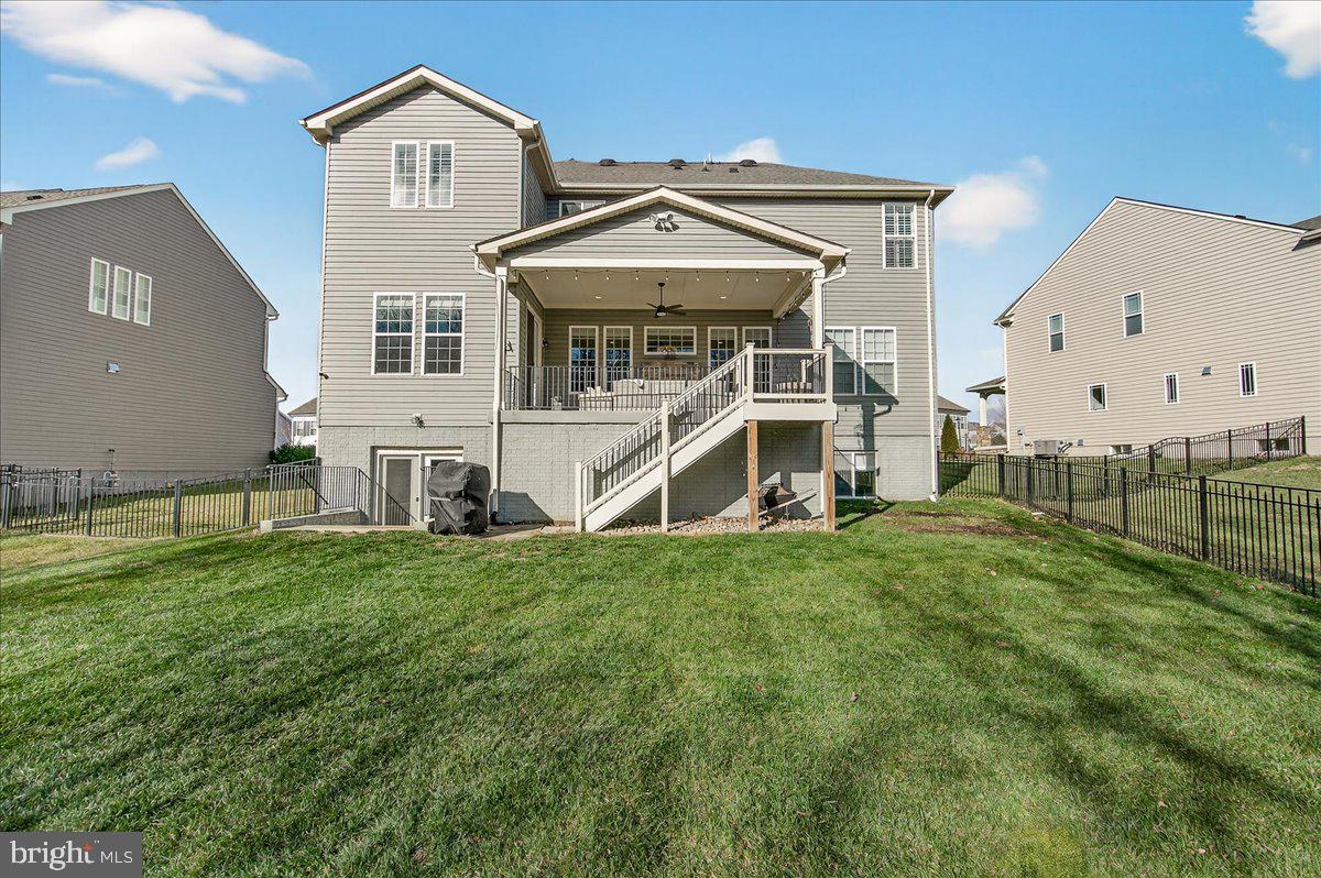 5487 Tallyn Ridge Drive Frederick, MD 21704 - Photo 62 of 80 a view of a house with a big yard and large trees